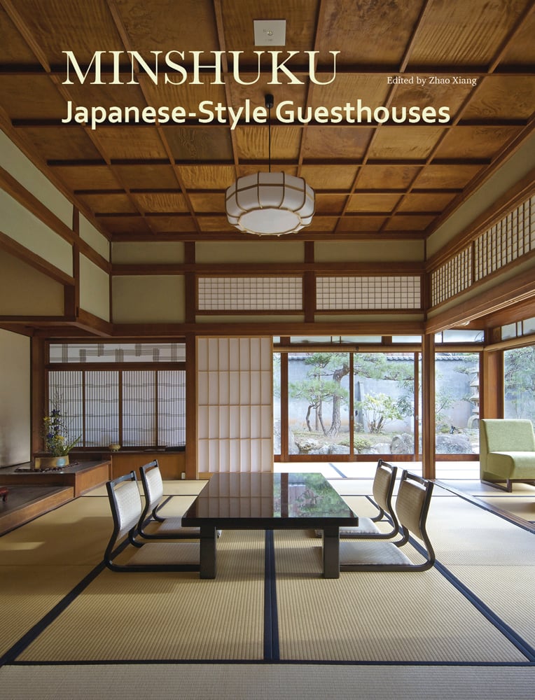 Book cover of Minshuku: Japanese-Style Guesthouses, featuring a minimalist wood interior, with low seats at table, and a Japanese screen. Published by Images Publishing.