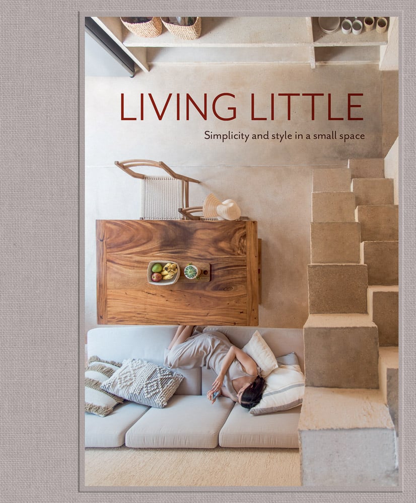 Book cover of Living Little: Simplicity and style in a small space, with an aerial view of figure lying on sofa. Published by Images Publishing.