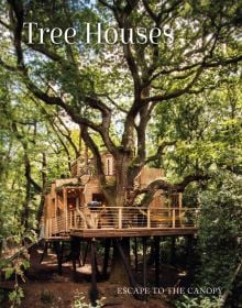 Book cover of Tree Houses: Escape to the Canopy, with a large low wooden tree house with balcony on stilts. Published by Images Publishing.