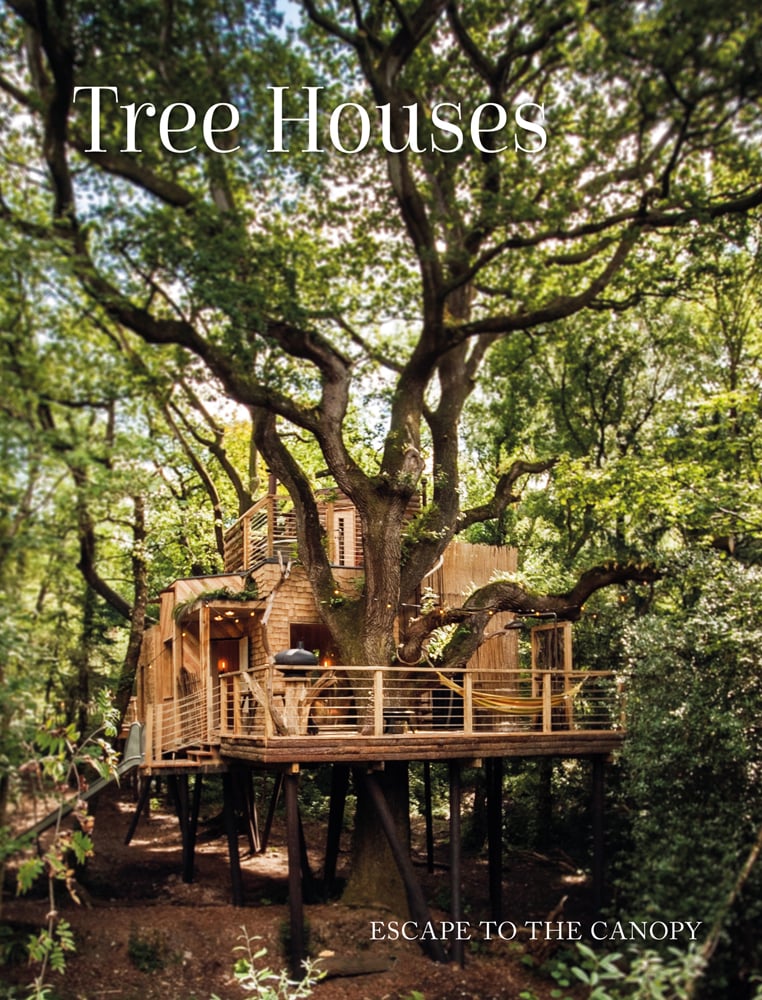 Book cover of Tree Houses: Escape to the Canopy, with a large low wooden tree house with balcony on stilts. Published by Images Publishing.