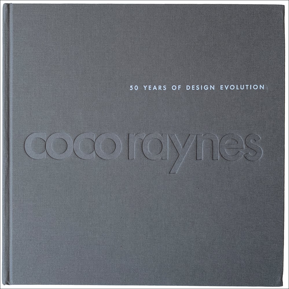 50 Years of Design Evolution in white font on grey woven cover, coco raynes in embossed font to centre.