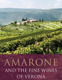 Book cover of Michael Garner's Amarone and the Fine Wines of Verona, featuring mountainous Italian vineyards with a winery in the distance. Published by Academie du Vin Library.