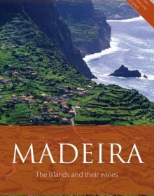 Book cover of Richard Mayson's guide, Madeira, The Islands and Their Wines, with an aerial view of vineyards on the coast, with the sea to the right. Published by Académie du Vin Library.