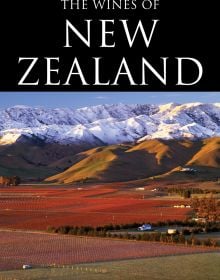 Book cover of Rebecca Gibb's guide, The Wines of New Zealand, featuring snow-topped mountains with hills and vineyards below. Published by Academie du Vin.