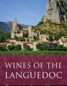 Book cover of Rosemary George's guide, Wines of the Languedoc, with Saint Jean de Bueges village and castle, with vineyards below. Published by Academie du Vin.