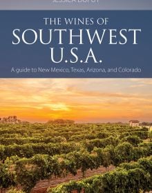 Book cover of Jessica Dupuy's guide, The Wines of Southwest U.S.A, with vineyards under a bright yellow sun. Published by Academie du Vin.