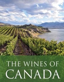 Book cover of Rod Phillips's guide, The Wines of Canada, with vineyards on the coast, mountains behind. Published by Academie du Vin Library.