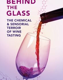 Book cover of Behind the Glass: The Chemical and Sensorial Terroir of Wine Tasting, with a glass of red wine being poured. Published by Academie du Vin Library.