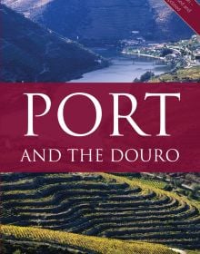 Book cover of Richard Mayson's study, Port and the Douro, with a Rabelo boat with barrels of Porto wine aboard. Published by Academie du Vin Library.