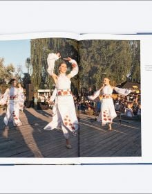 Book cover of Beloved Ukraine, Photographs by Paul Chesley, with a girl with long flowing hair wearing a floral headpiece. Published by ORO Editions.