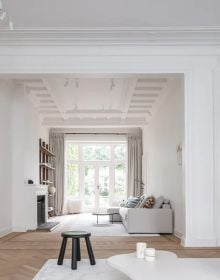 Book cover of World's Best, 50 Interiors from Around the Globe, featuring a kitchen interior of black and white marble features, and black wood, floor to ceiling storage. Published by Beta-Plus.