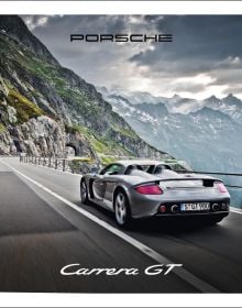 Book cover of Porsche Carrera GT, with a gray sportscar driving on roads around mountainous landscape. Published by Delius Klasing Verlag GmbH.