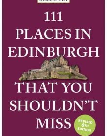 Edinburgh Castle near center of purple cover of '111 Places in Edinburgh That You Shouldn’t Miss', by Emons Verlag.