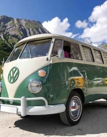 Book cover of 111 VW Bus Stories That You Should Know, with a yellow VW campervan with split-screen. Published by Emons Verlag.