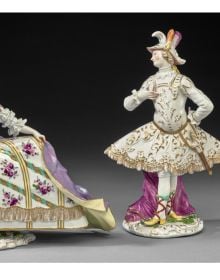 Book cover of Magnificence of Rococo: Kaendler’s Meissen Porcelain Figures, with a porcelain figurine of two figures. Published by Arnoldsche Art Publishers.