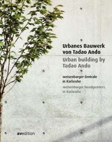 Slender stemmed tree with green leaves in front of pale grey concrete wall, on cover of 'Urban building by Tadao Ando, weisenburger headquarters in Karlsruhe', by Avedition.