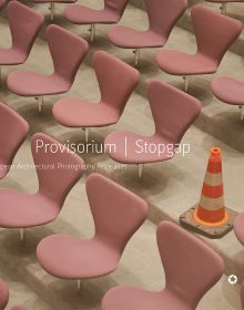 Rows of pale pink chairs with one replaced by orange and white striped traffic cone, on cover of 'Provisorium / Stopgap, European Architectural Photography Prize 2023', by Avedition.