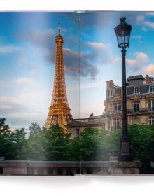 Book cover of Paris, featuring The Pont Alexandre III arch bridge over the Seine in the French city. Published by teNeues Books.