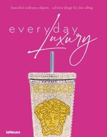 Book cover of Agata Toromanoff's Everyday Luxury: Beautiful Ordinary Objects, with a diamond encrusted steel drinks cup with straw, by Versace. Published by teNeues Books.