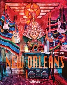 Book cover of Werner Pawlok's New Orleans, with colourful interior with guitars on wall and religious figure to centre. Published by teNeues Books.