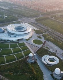 Book cover of Ennead Architects, Architecture of the Cosmos: Shanghai Astronomy Museum, with an aerial plan of interior of building. Published by Tongji University Press.