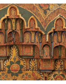 Book cover of Splendours of the Atlas: A Voyage Through Morocco’s Heritage, with an aerial view of fountain surrounded by a decorative mosaic floor. Published by Silvana.