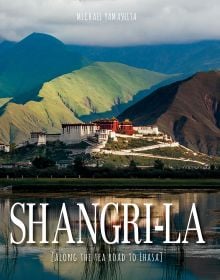 Book cover of Shangri-La, Along the Tea Road to Lhasa, with Lhasa hotel in the mountains. Published by White Star.