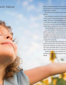 Book cover of Exploring the Nature: Montessori Lab, Educating with Nature, with a child lying in long green grass, wearing explorers pith hat, looking through pair of red binoculars. Published by White Star.