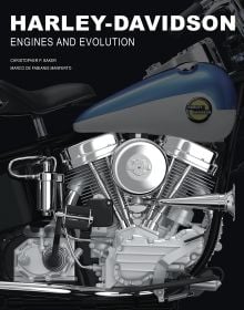 Book cover of Harley-Davidson, Engines and Evolution, with a close-up of chrome motorcycle engine, with blue and white tank. Published by White Star.