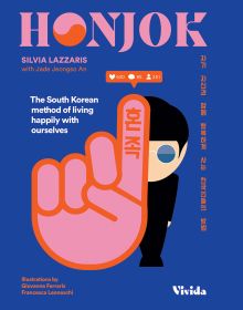 Book cover of Honjok, The South Korean Method to Live Happily With Ourselves, with a figure in black holding palm of hand out with index finger raised, Published by White Star.