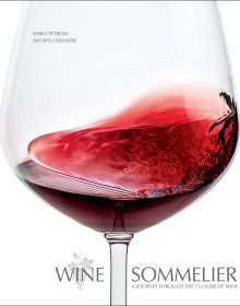 Book cover of Wine Sommelier, A Journey Through the Culture of Wine, with a glass with red wine being swirled around. Published by White Star.