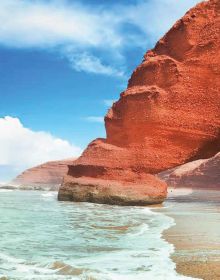 Book cover of The Sea, A World to Preserve, with Salento beach area with bright blue water and rocky coast. Published by White Star.