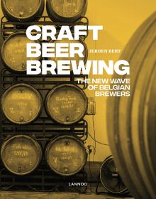 Beer brewing equipment with brewer, on cover of 'Craft Beer Brewing: The New Wave of Belgian Brewers', by Lannoo Publishers.