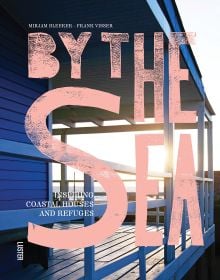 Book cover of By the Sea: Inspiring Coastal Houses and Refuges, with an interior of coastal home made of wood. Published by Luster Publishing.