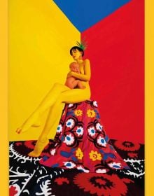 Book cover of The Endless Coloured Ways, featuring a nude female holding baby, sitting on a stool covered with brightly-colored floral rug. Published by Hannibal Books.