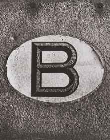 Large letter 'B' to center of gray textured cover of 'Belgicum', by Hannibal Books.